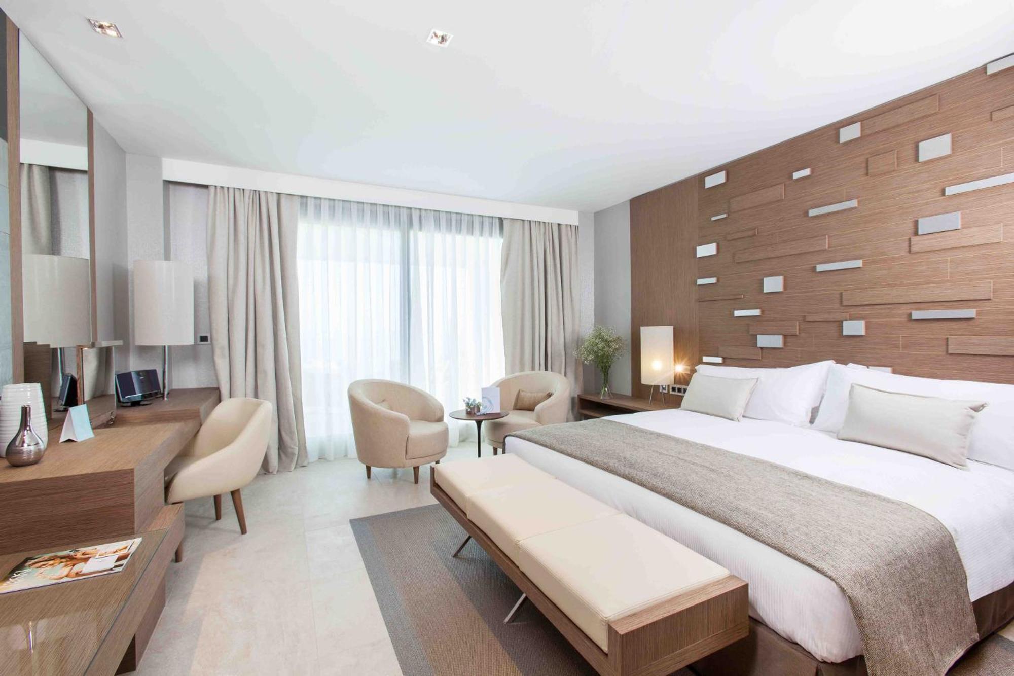 Don Carlos 马尔韦利亚 外观 照片 A bedroom at the hotel