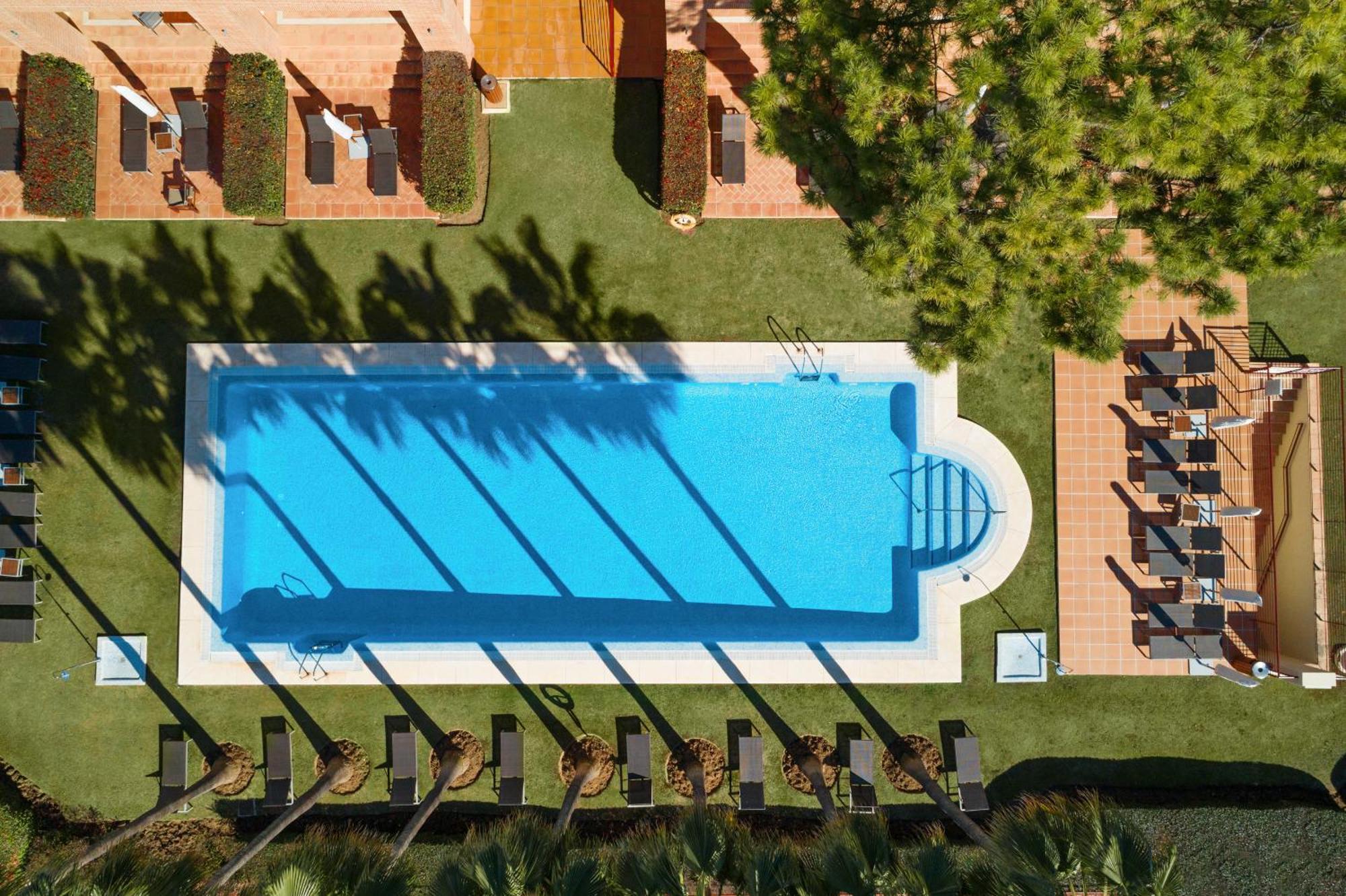 Don Carlos 马尔韦利亚 外观 照片 Aerial view of a swimming pool